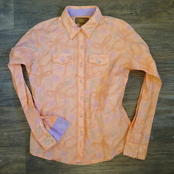 Aura from the Women at Wrangler Long Sleeve Western Snap Bow Shirt. - Picture 8 of 11